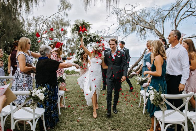 Wedding couple celebrating getting married at Casuarina Grove